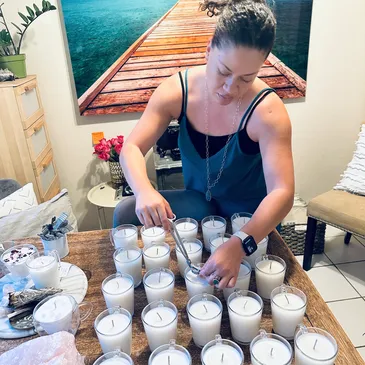 Rae Can handcrafting Reiki-infused candles